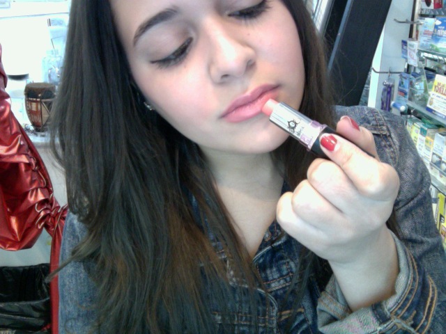 Lioele Cosmetics popular Dollish Lipstick is being tried on at Thompson Alchemists in NYC