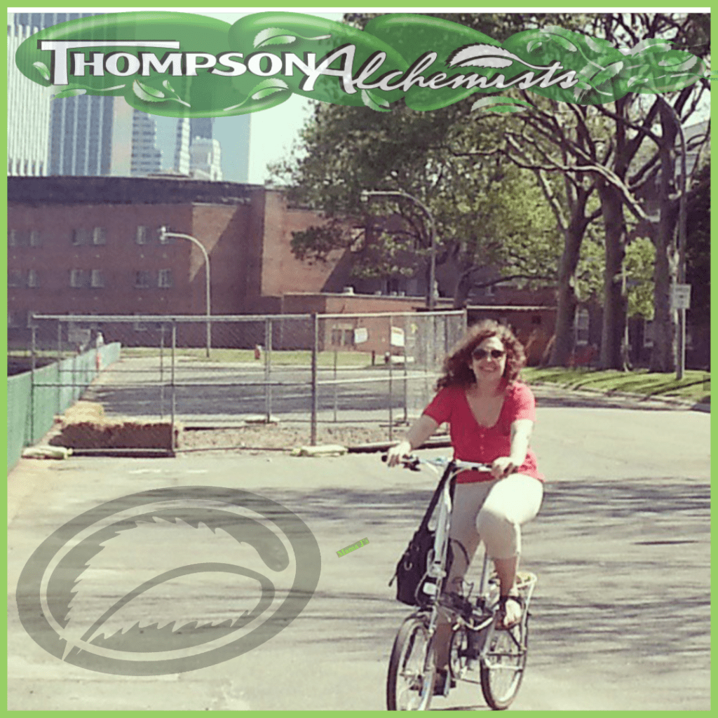 Jolie Alony thompson alchemists and thompson chemists very own riding her bike to work through NYC to historical soho, ny